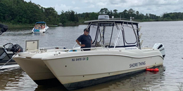 Shore Thing Charters World Cat Boat image 0