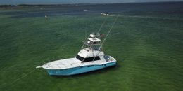 Ana Banana Fishing Company Hatteras Boat image 0