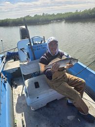 You'll Hookem Grizzly Boat image 0