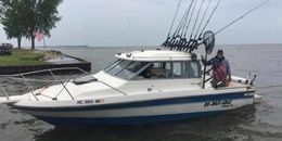 De-Bait-Able Fishing Adventures Wellcraft Boat image 0