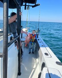 In Too Deep Charters Angler Boat image 0