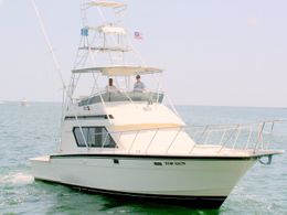 Top Gun Charters Hatteras boat image 0
