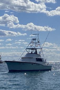 It's Never Enough Sport Fishing Hatteras Boat