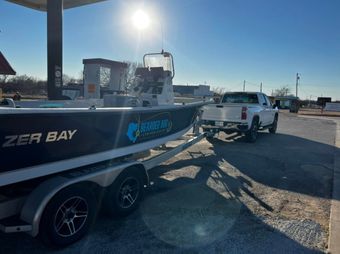Bearded Dog Striper Guide Service Blazer Bay boat