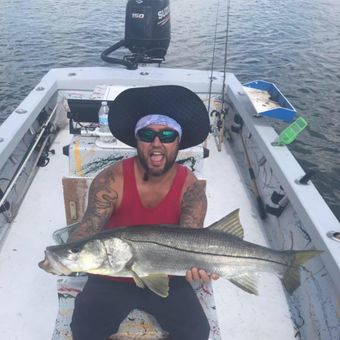 Burning Drag Fishing Charters Skiff boat