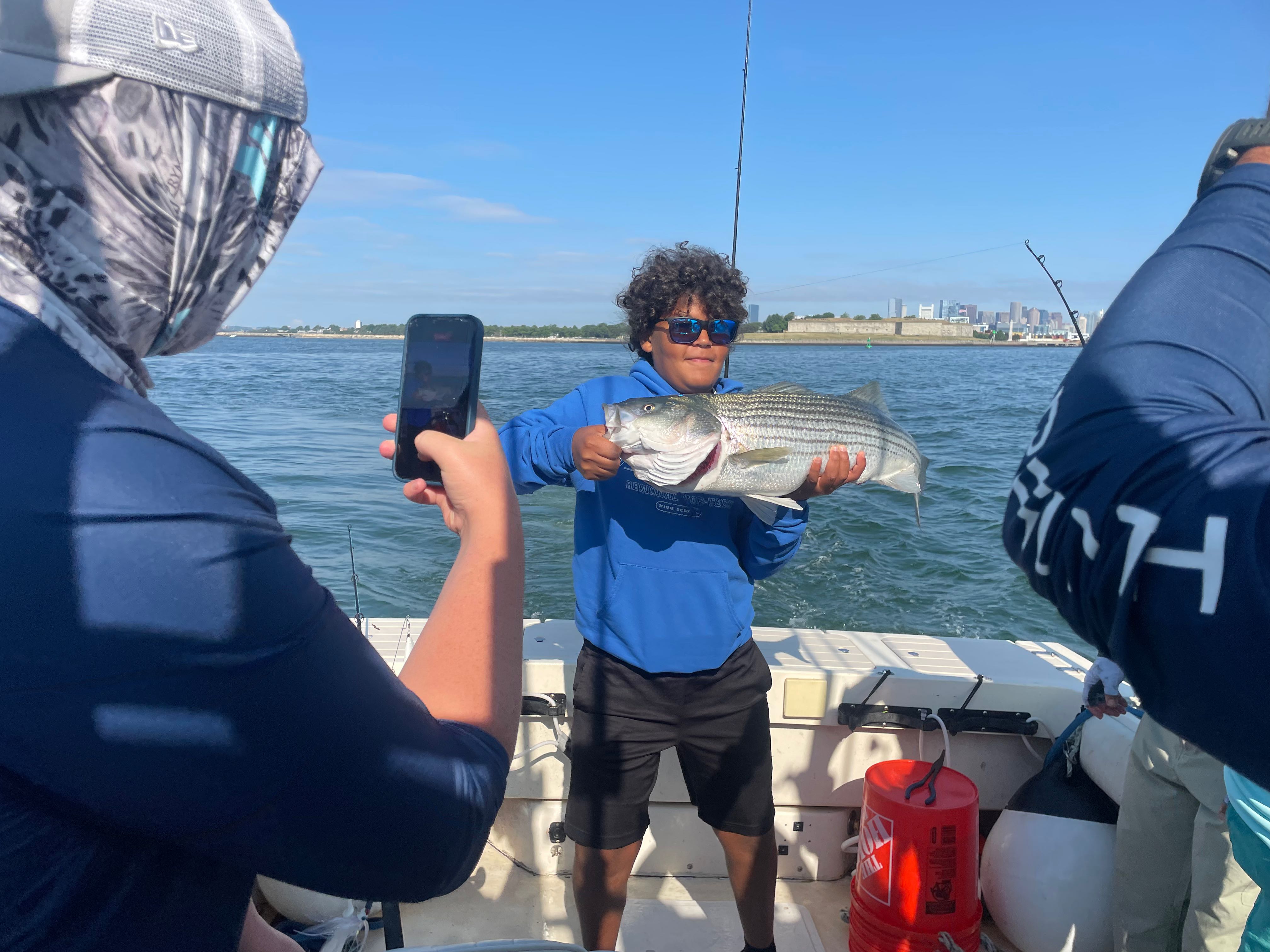Beautiful Hingham striped bass making the day complete!