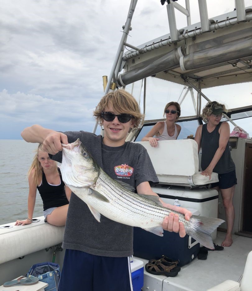 Proud Striped Bass Catch