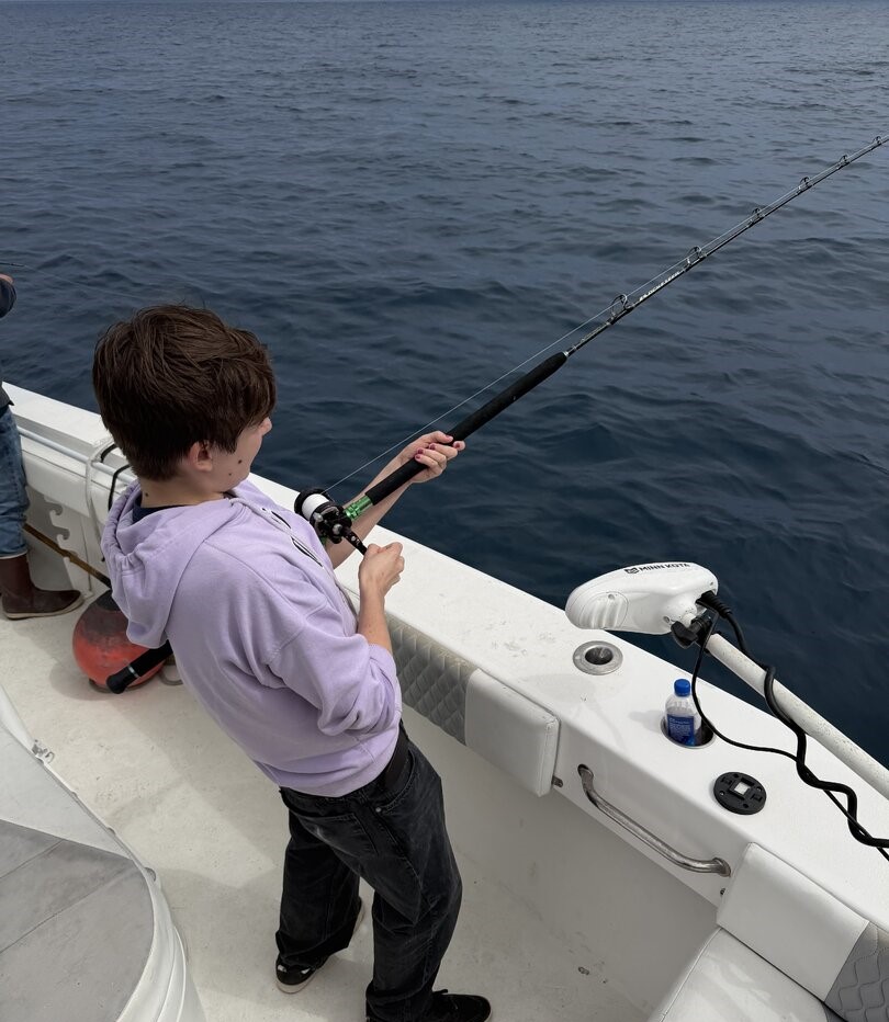 Focused offshore fishing rod bend action