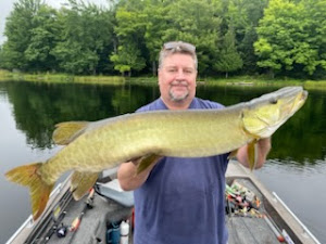 Big smiles and even bigger catches on Wisconsin waters.