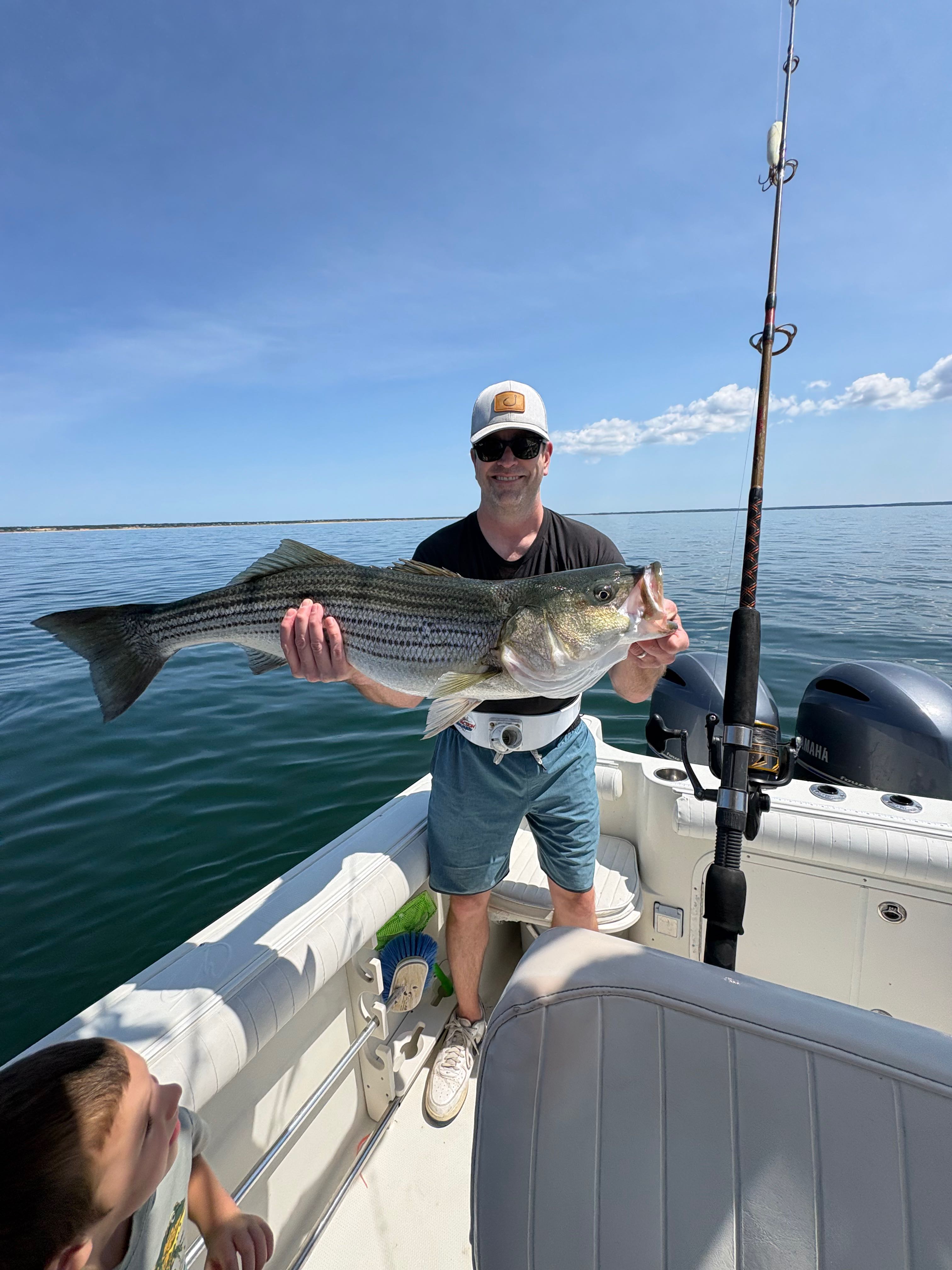 Beautiful East Dennis striped bass on the boat!