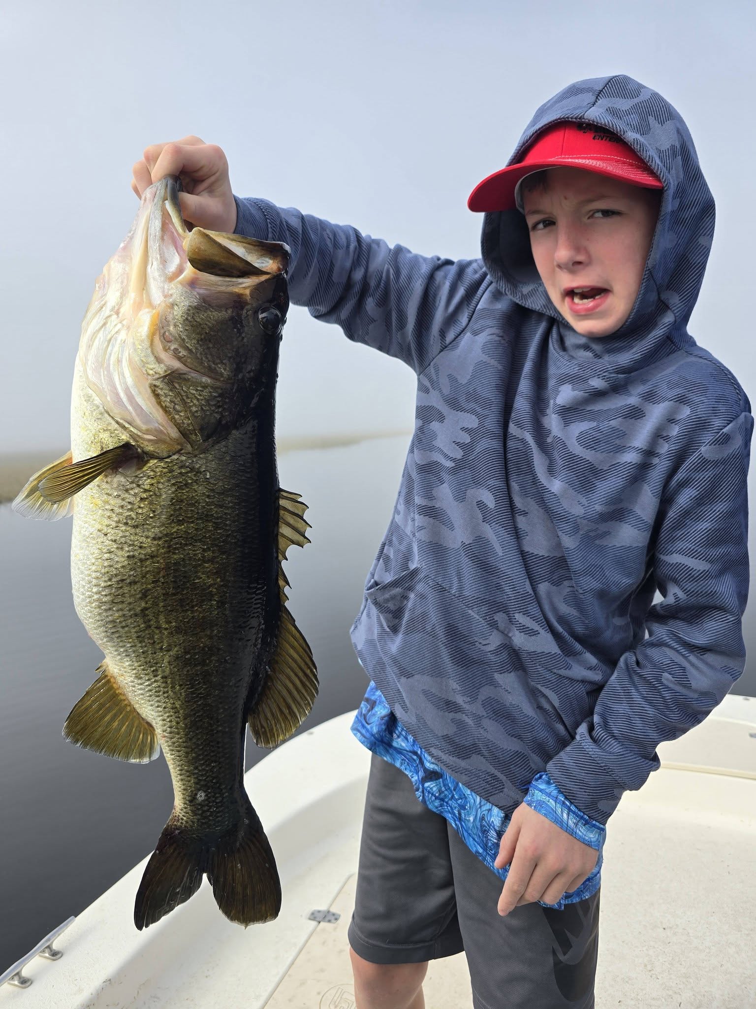 Big largemouth bass on a family fishing trip