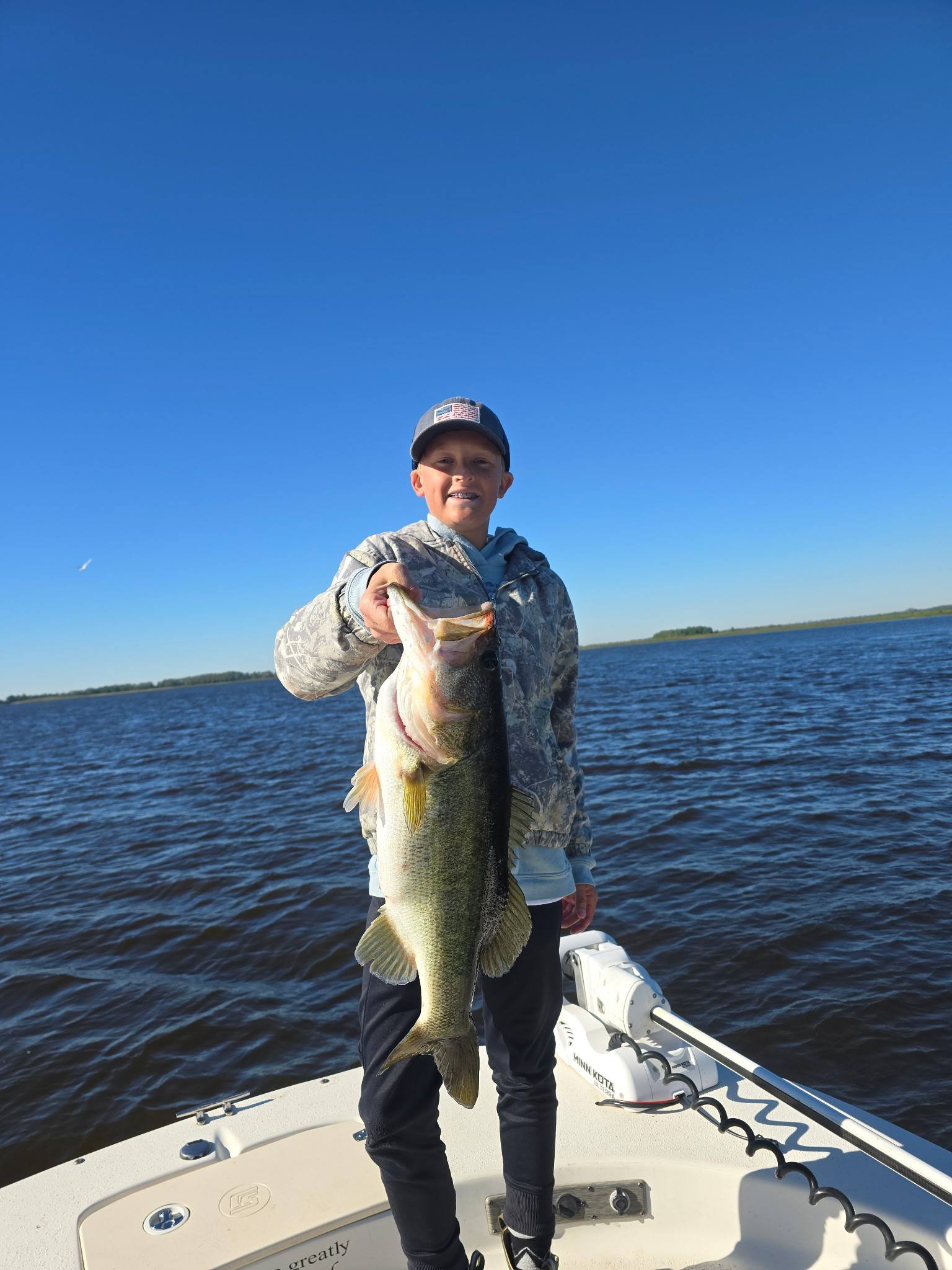 Impressive largemouth bass on a calm family fishing trip
