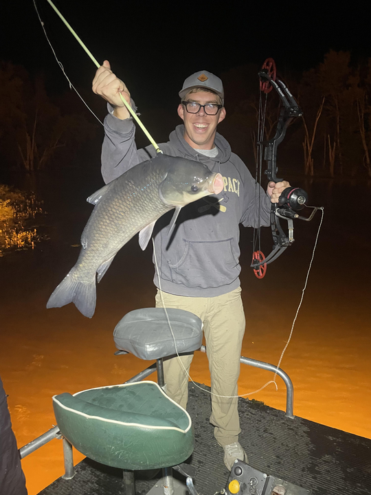 Exciting night bow fishing session at North Lake - perfect conditions for landing this beauty!