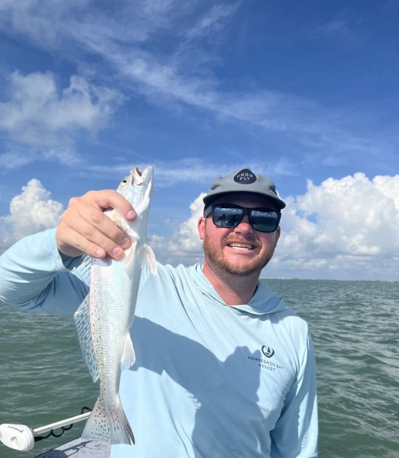 Bright speckled trout action on calm water!