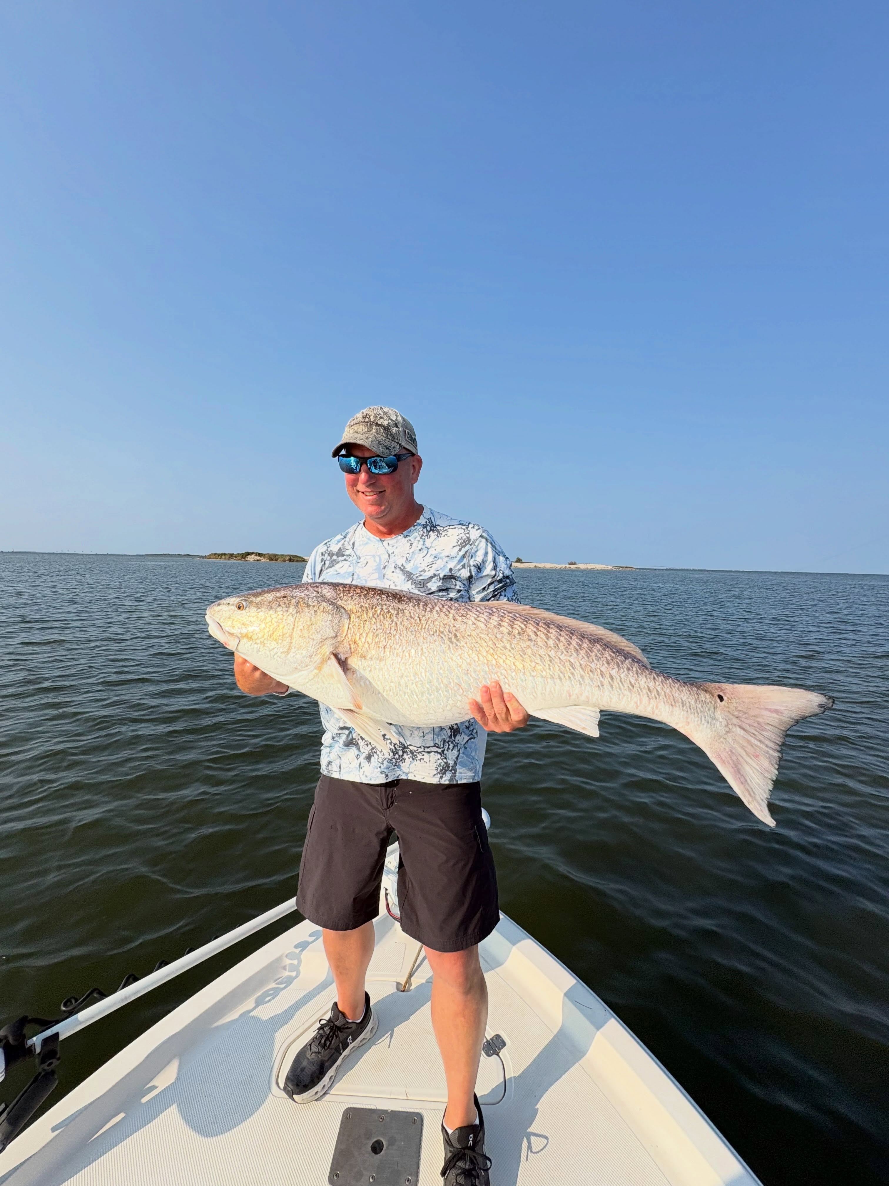 Beautiful Wanchese NC redfish making memories on the water!