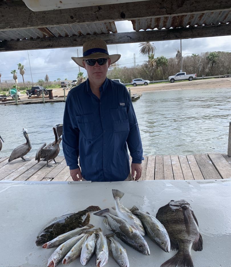 Mixed Galveston Bay catch—speckled trout, flounder, and black drum.
