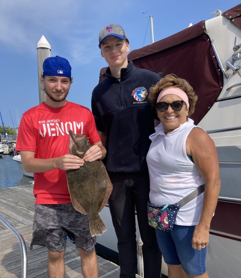 Solid flounder catch on a family fishing trip