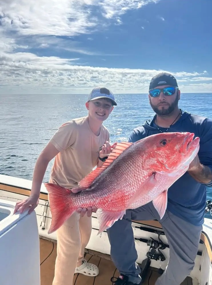 Beautiful Pensacola Beach red snapper hitting the deck!