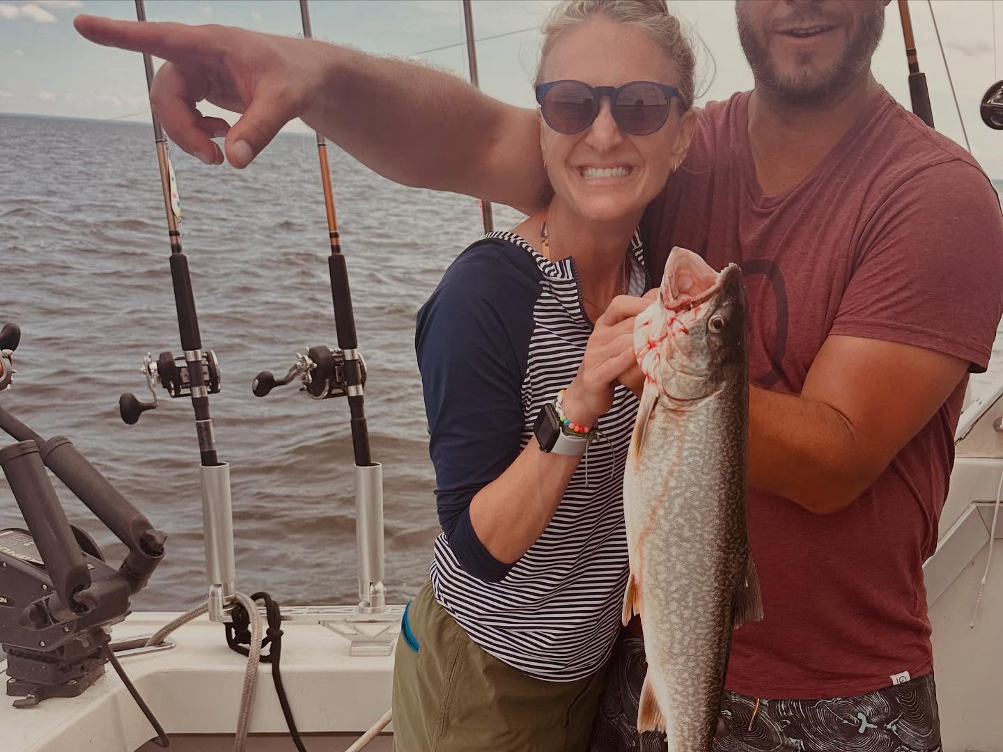 Smiling with success – Lake Trout catch on the boat!
