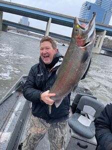 Angler fishing for a rainbow trout in Wyoming