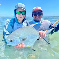 Two people fishing for a permit fish in New York