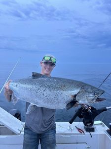 A fisherman reeling in a catch in Michigan