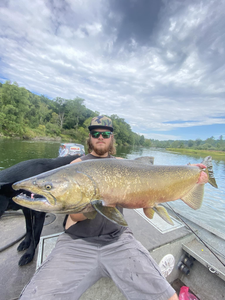 A single person fishing in the waters of Frankfort
