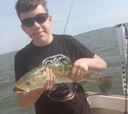 Angler with fishing rod enjoying the great outdoors in NC