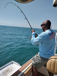 Angler with rod enjoying fishing tour in North Carolina