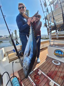 Reeling in the big one at the docks.