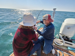 Reeling in a relaxing day on the water.