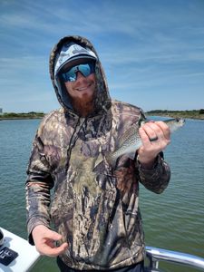 A scenic fishing trip in North Carolina with 2 people