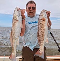 Two big redfish caught on a fishing trip in Wanchese