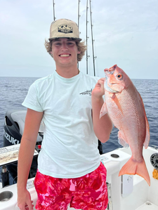 Angler holding a 20-inch fish in FL