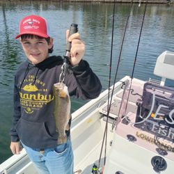 Angler with a beautiful rainbow trout in Branson