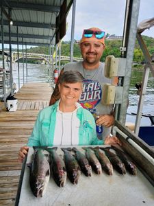 Two anglers with 5 rainbow trout in Branson