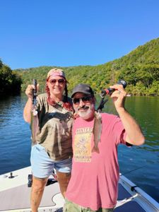 Two anglers fishing for rainbow trout in Missouri