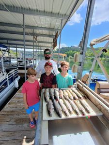 Four people fishing in Branson
