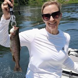 A single rainbow trout caught while fishing in Branson