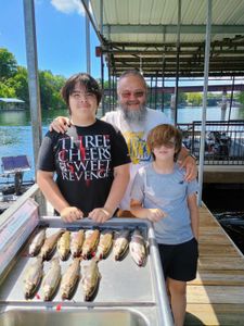 3 people fishing in Branson