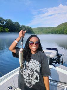 A person fishing in Branson, Missouri