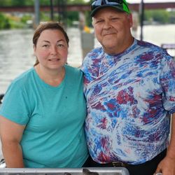 Two people fishing in Branson