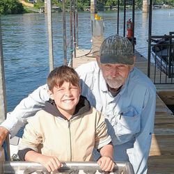 Two people fishing in Branson