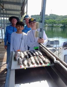 Four people enjoy fishing in Missouri