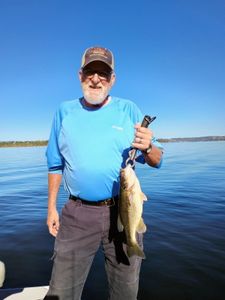 A person fishing in Branson, a best and great catch