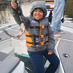 Two people fishing in Branson