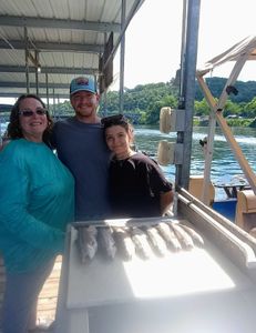 Three people fishing in Missouri