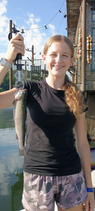 Stormy skies can't stop this 16-inch rainbow trout!