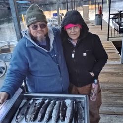 Two people fishing in Branson