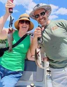 Two rainbow trout caught fishing in Branson